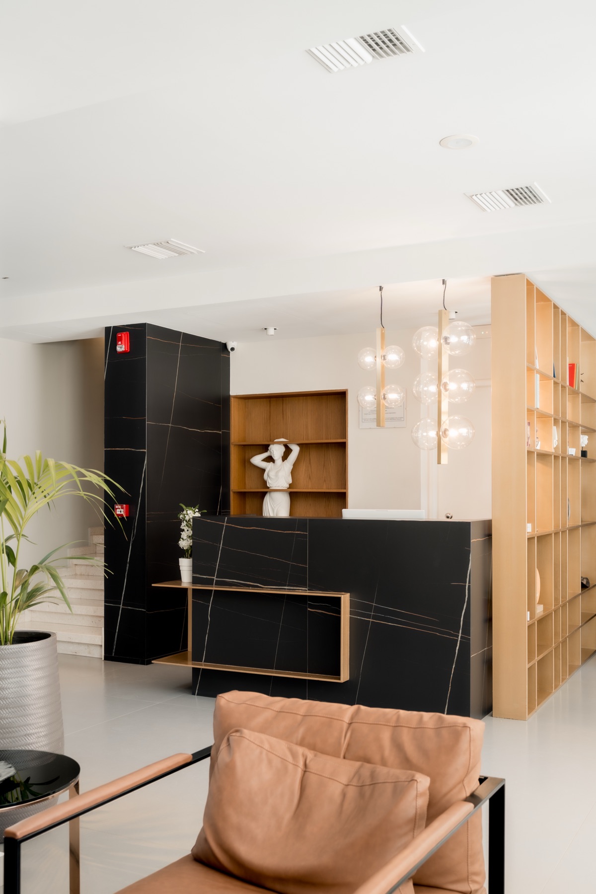 The lobby and black marble reception desk